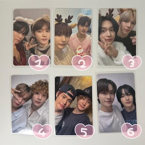 May include: Six photo cards featuring pairs of young people. The cards have a white border. Some of the people are wearing festive headbands. The photos are taken indoors, with varying backgrounds and lighting.
