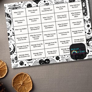 May include: A rectangular white card featuring a black grid with thirty prompts for self-reflection, surrounded by black and white celestial and insect illustrations. A black circular logo with a rainbow and the text Witchy & Bitchy Conjurations.