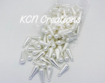 Hmong beads. 20mm teardrop beads with loops on top. Available in pearl white, AB white/cream, AB clear, AB red.