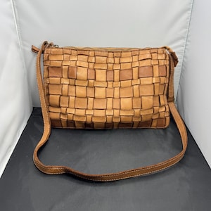 louis vuitton backpack wristlet Discovery PM Kaki Red Vermillon Autres Toiles Glam Origins Distressed Leather Backpack COLOR:902-LACQUER body wear.