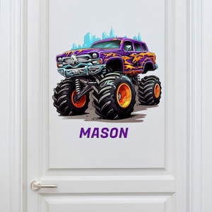 May include: Purple monster truck with orange wheels and flames on the side. The truck has a skull on the front grill. The name "MASON" is written in purple below the truck.