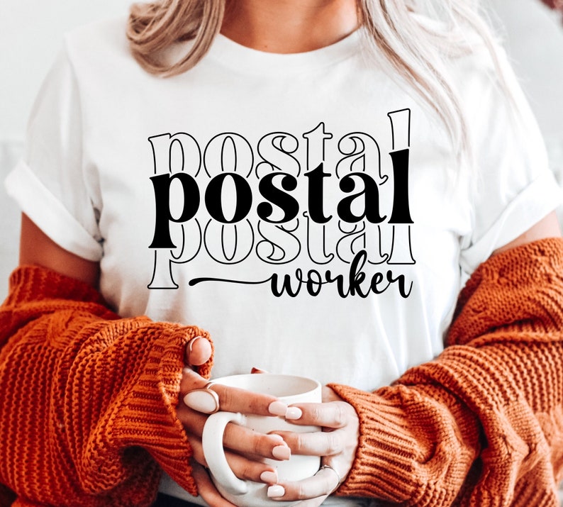 May include: A white t-shirt with black text that reads "postal worker" with the word "postal" repeated in a layered design.