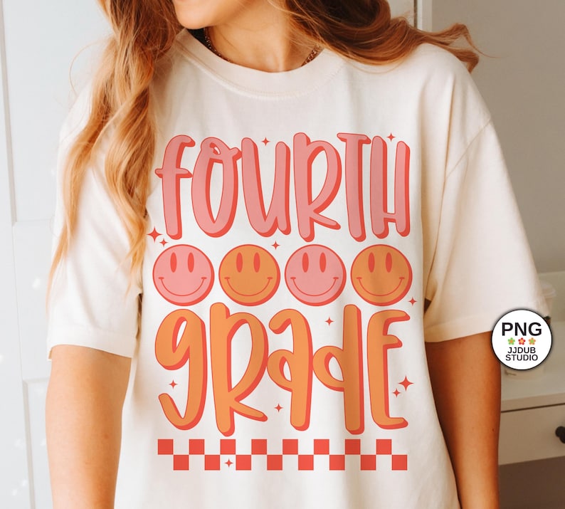 May include: A white t-shirt with the text "FOURTH GRADE" in pink and orange with a row of four smiley faces in pink and orange above the text. The text has a retro, 70s style font. There is a checkered pattern at the bottom of the shirt.