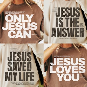 May include: Four sweatshirts with religious text. One is brown with "ONLY JESUS CAN" in white. Another is beige with "JESUS IS THE ANSWER" in black. A third is beige with "JESUS SAVED MY LIFE" in black. The last is brown with "JESUS LOVES YOU" in white.