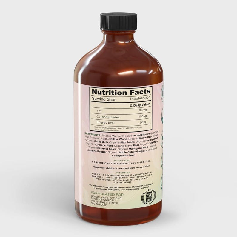 May include: A brown glass bottle with a white label listing the nutritional information and ingredients of a liquid supplement. The label includes the text "Nutrition Facts", "Serving Size: 1 tablespoon", "% Daily Value", "Fat 0.079", "Carbohydrates 0.050", "Energy kcal 090", "Ingredients: Filtered Water, Organic Sour Soup Leaves, Fruit Extracts, Organic Bitter Wood, Organic Ginger Root Extract, Organic Garlic Bulb, Organic Flax Seeds, Organic Moringa Leaf, Organic Turmeric Root, Organic Maca Root, Organic Sea Moss, Organic Tomato, Organic Apple Cider Vinegar, and Organic Sarsaparilla Root."