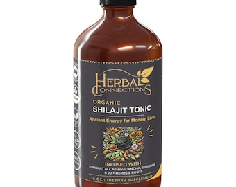 May include: A brown bottle with a black cap, labelled "Herbal Connections Organic Shilajit Tonic." The label includes text: "Ancient Energy for Modern Lives" and "Infused with Tongkat Ali, Ashwagandha, Spirulina & 20+ Herbs & Roots." The bottle contains 473 ml of dietary supplement.