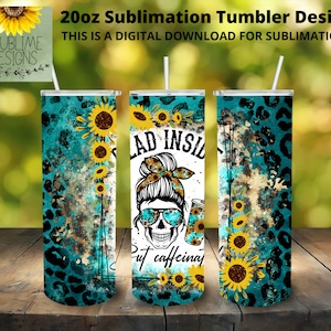 May include: A 20 ounce sublimation tumbler design featuring a skull with sunglasses and a messy bun, surrounded by sunflowers and a leopard print pattern. The text "Bad inside but caffeinated" is displayed on the tumbler.