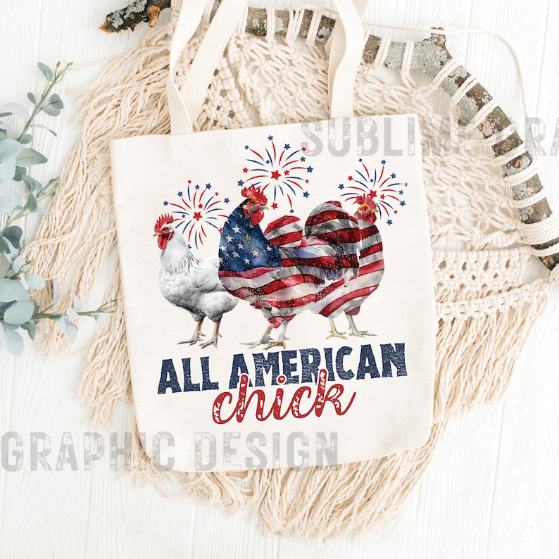 May include: Cream-colored tote bag featuring three rooster illustrations with fireworks. The central rooster is designed with an American flag pattern. The text "ALL AMERICAN chick" is printed in navy and red. The bag has cream-colored handles.