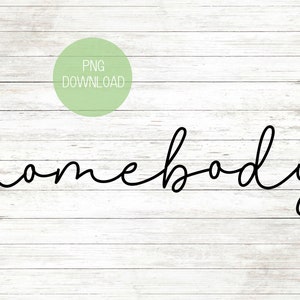 May include: Black and white cursive text on a white wood background. The text reads "homebody".