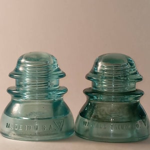 Aquamarine glass insulators 1944 Paperweight or candleholder