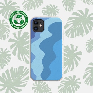 May include: A blue and white phone case with a wavy pattern. The case is made from 100% biodegradable material.