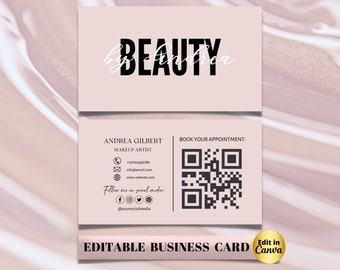 May include: Editable business card template for a makeup artist. The card is pink with black text and a QR code. The text includes the name "Andrea Gilbert", the title "Makeup Artist", contact information, and social media handles. The text "Beauty by Andrea" is featured in a larger font at the top of the card.