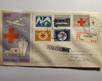 Sobre de primer día de emisión de los Países Bajos de 1957 enviado a Riga, URSS – Cruz Roja – Correo certificado