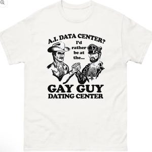 May include: White t-shirt with a black and white graphic. The graphic features two men shaking hands, one in a cowboy hat and the other in a leather cap. Text reads "A.I. DATA CENTER? I'd rather be at the... GAY GUY DATING CENTER."