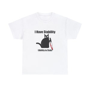 May include: White t-shirt with a black cat holding a bloody knife. The text on the shirt reads "I Have Stability (Ability to Stab)"