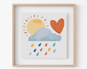 May include: A framed print with a colorful illustration of a sun, a cloud, a heart, and raindrops. The sun is yellow with orange rays, the cloud is blue, the heart is red, and the raindrops are various colors.