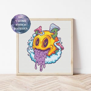 May include: Cross stitch pattern of a yellow smiley face with purple dripping slime, surrounded by white clouds and colorful mushrooms.