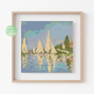 May include: A cross stitch pattern of a city skyline with buildings reflected in the water. The sky is a light blue with white clouds. The buildings are white with a light yellow tint. The water is a light blue with a green tint.