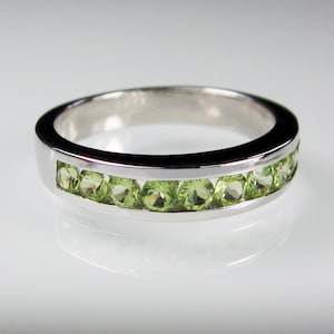 Genuine Peridot half eternity ring