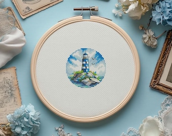 Schema punto croce Faro blu: paesaggio marino rotondo (schema PDF)