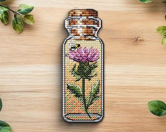 Patrón de punto de cruz de flor de cardo en botella (PDF)