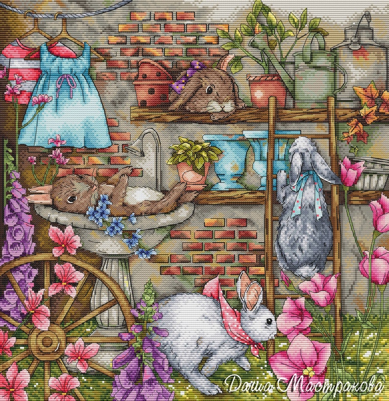 May include: A detailed cross-stitch design featuring a whimsical garden scene. Bunnies, flowers, and gardening tools are depicted against a brick wall backdrop. A blue dress hangs on a clothesline, adding a touch of domesticity.