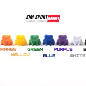 May include: A collection of eight colorful frog figurines in red, orange, yellow, green, blue, purple, white, and black. Each frog is labeled with its respective color name in a sans-serif font. The brand name "SIM SPORT GADGET" is displayed at the top.