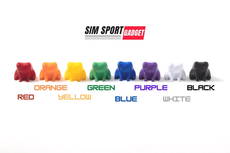 May include: A collection of eight colorful frog figurines in red, orange, yellow, green, blue, purple, white, and black. Each frog is labeled with its respective color name in a sans-serif font. The brand name "SIM SPORT GADGET" is displayed at the top.