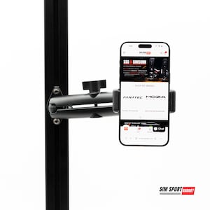 May include: A black phone mount attached to a black pole. A smartphone is secured in the mount, displaying a website with the text "SSG x SIMSONN" and "FANATEC MOZA". The base of the pole has the text "SIM SPORT GADGET".