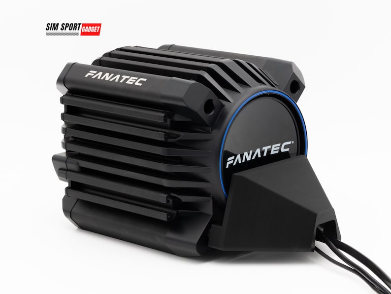 May include: A black Fanatec direct drive wheel base with a blue trim ring and the Fanatec logo on the front. The base has a ribbed design and is connected to a black cable.