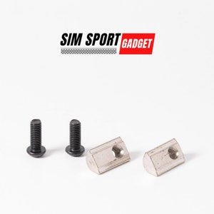 May include: Two black screws and two silver T-slot nuts for mounting a piece of equipment. The nuts have a triangular shape and a threaded hole. The screws have a hexagonal head.