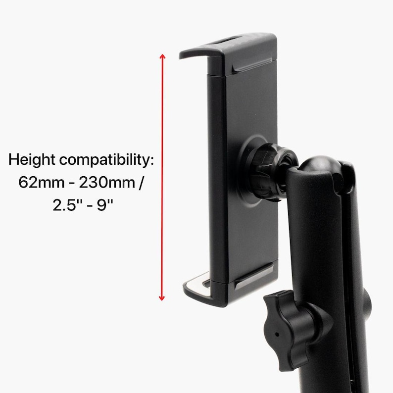 May include: Black tablet holder with adjustable arm and knob. The text on the image reads: Height compatibility: 62mm - 230mm / 2.5" - 9". The holder is designed to accommodate devices with a height between 2.5 and 9 inches.