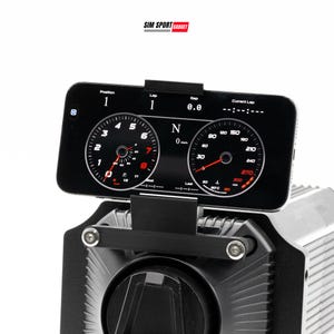 May include: A black smartphone displaying a racing dashboard interface, mounted on a black bracket. The screen shows speed, RPM, and lap data. The SIM SPORT GADGET logo is visible at the top.