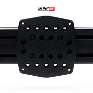 May include: Black plastic mounting plate with a grid of holes for attaching accessories. The plate is labeled "SIM SPORT GADGET".