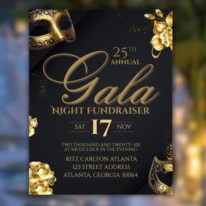 May include: A black gala invitation card featuring gold masquerade masks and gold floral accents. The text reads 25th Annual Gala Night Fundraiser, Sat 17 Nov, Two Thousand and Twenty-Six at Six O'Clock, Ritz Carlton Atlanta, 123 Street Address, Atlanta, Georgia 30064.