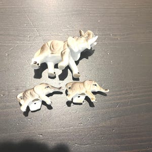Vintage Set of 3 Matte Finished Porcelain Elephant Figurines