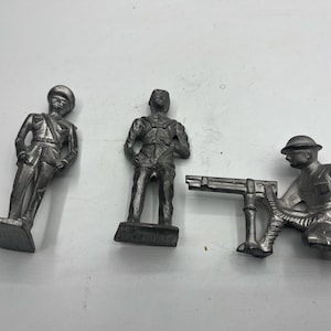 A Trio of Miniature Lead Toy Soldiers