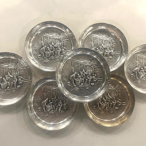 Set of 7 Denmark Silverplate Coasters