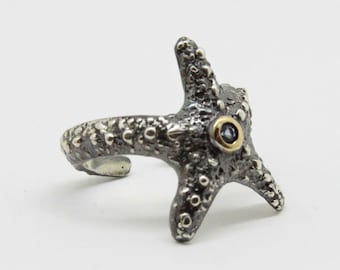 Anillo ajustable de estrella de mar en plata de ley: joya con aguamarina oxidada
