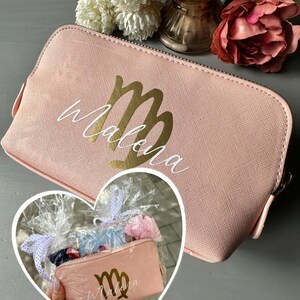 Personalized cosmetic bag with name and zodiac sign pink