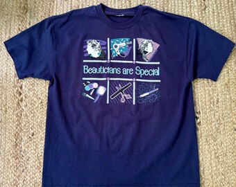 Vintage 90s navy blue T-shirt with beautician graphics