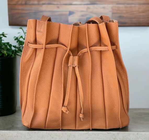 Designer drawstring bucket bag sales