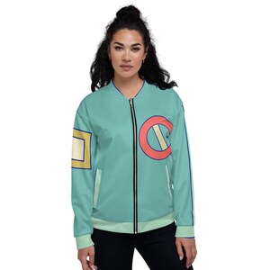 May include: A teal blue bomber jacket with a red circle and a yellow square on the sleeves. The circle has a white line through it.