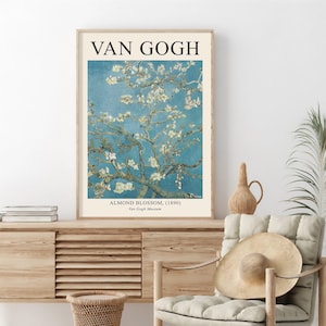 May include: A vintage poster featuring a painting of a blooming almond tree with white blossoms against a blue sky. The poster is titled "Van Gogh" and includes the painting's title, "Almond Blossom (1890)", and the Van Gogh Museum.