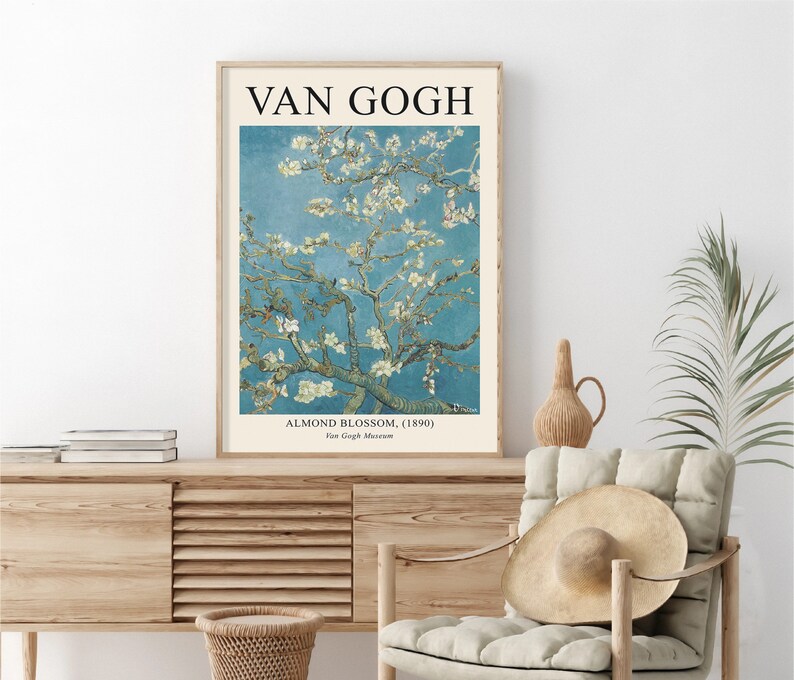 May include: A vintage poster featuring a painting of a blooming almond tree with white blossoms against a blue sky. The poster is titled "Van Gogh" and includes the painting's title, "Almond Blossom (1890)", and the Van Gogh Museum.