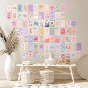 May include: A wall gallery featuring 36 colorful prints with various designs and text. The prints are arranged in a grid pattern and include phrases like "Sun Day", "You're a Star", "Wave", "Let's Party", "Good Vibes", and "Be Happy".