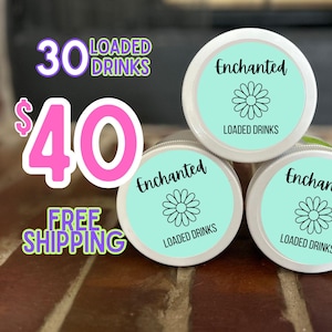 May include: Three 30 ml glass jars with white lids and turquoise labels. The labels have a black daisy design and the text "Enchanted Loaded Drinks". The text "30 Loaded Drinks $40 Free Shipping" is in pink and purple letters.