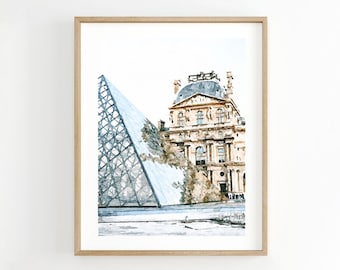 May include: A watercolour painting of the Louvre Museum in Paris, France. The painting features the iconic glass pyramid in front of the building. The pyramid is a light blue colour, while the building is a light brown colour. The painting is done in a soft, muted style.