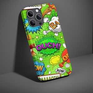 May include: A green phone case with a comic book design featuring colorful speech bubbles with words like "Bang!" "Ouch!" and "Pow!"