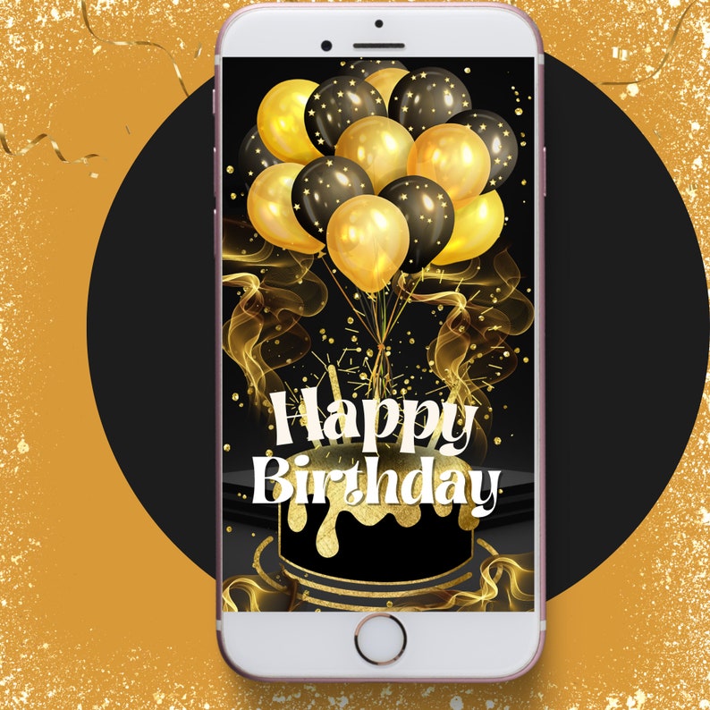Op de afbeelding: Een zwarte smartphone met een gouden en zwarte verjaardagstaartontwerp op het scherm. Het scherm toont de tekst "Happy Birthday" met gouden ballonnen op de achtergrond.